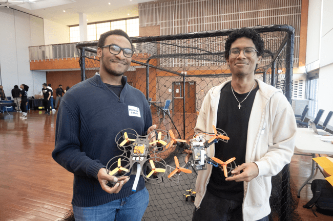 CEA student leaders helping manage robotics camps and events